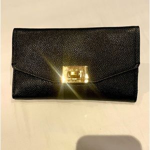 Like new MK black leather wallet with gold hardware